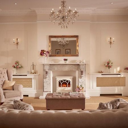 Bathen House Boutique Hotel Exterior photo A living room with a fireplace